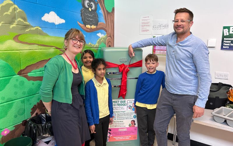 Eco Fridge inside a Newcastle primary school, filled with unserved school meals as part of Bind CIC and CDA’s sustainable food redistribution project. The initiative helps reduce school food waste and supports local families.